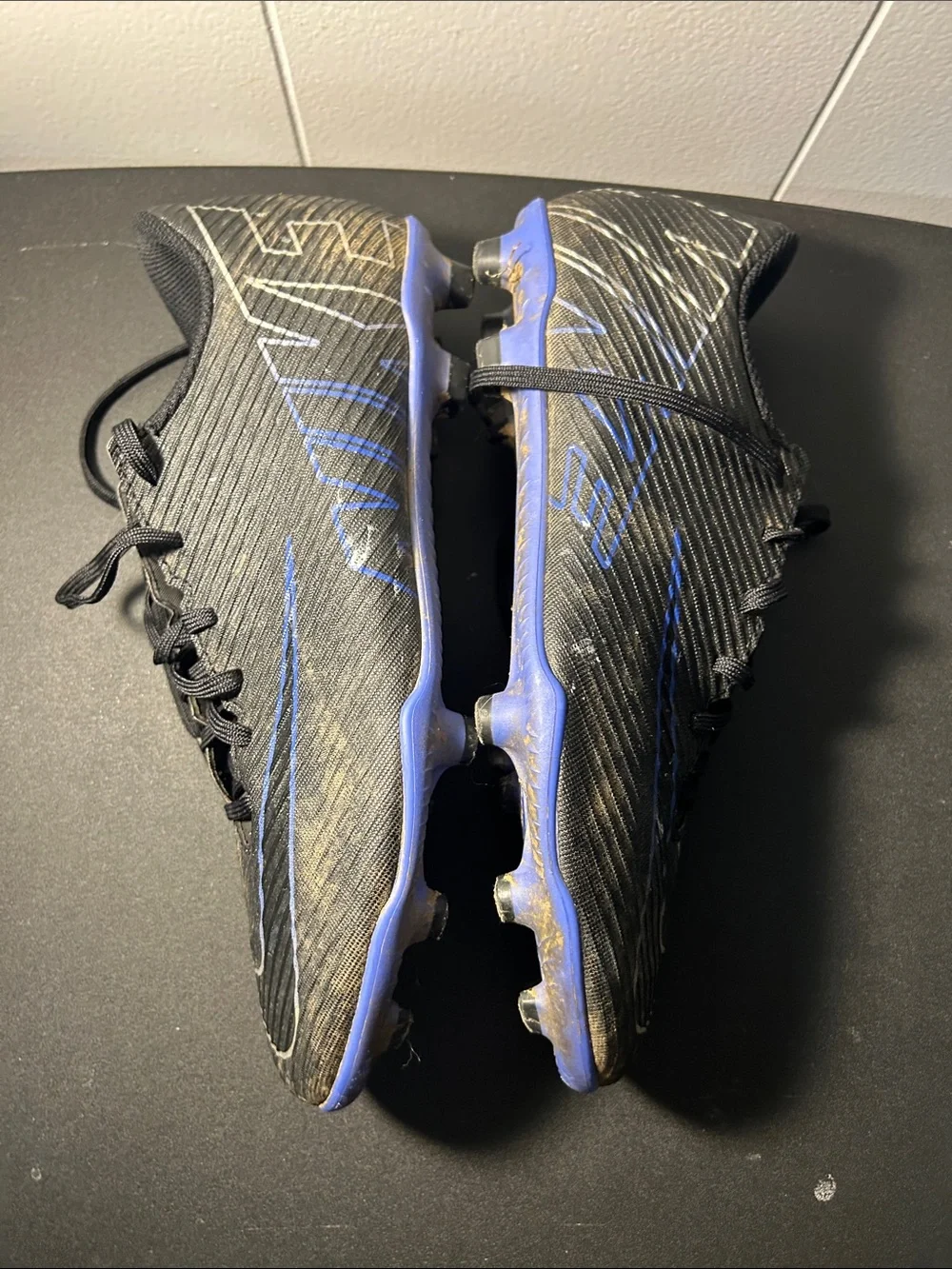 Nike  Black and Blue Soccer Cleat size 8